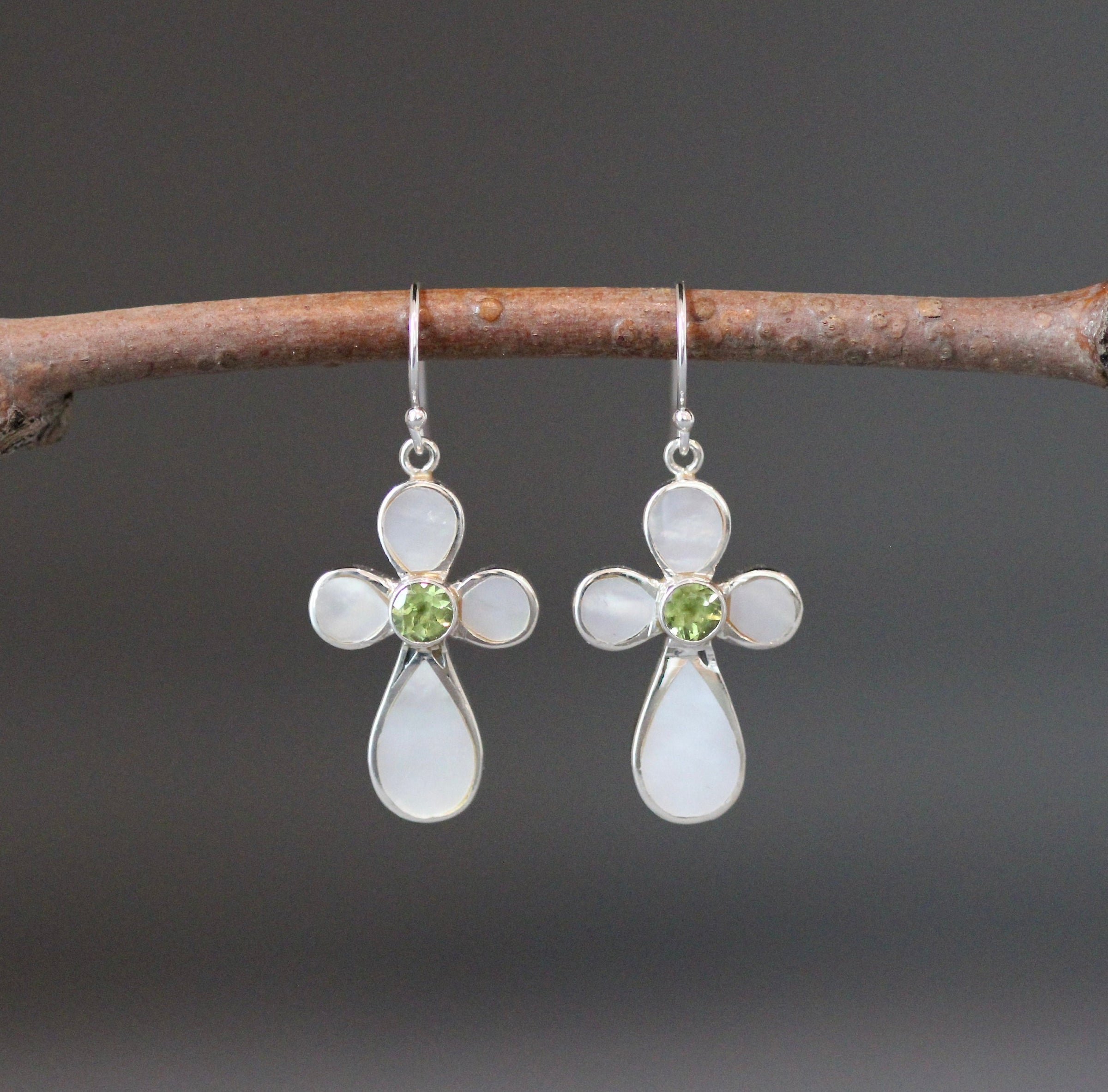 Sterling silver cross drop earrings: mother-of-pearl petals, peridot green center