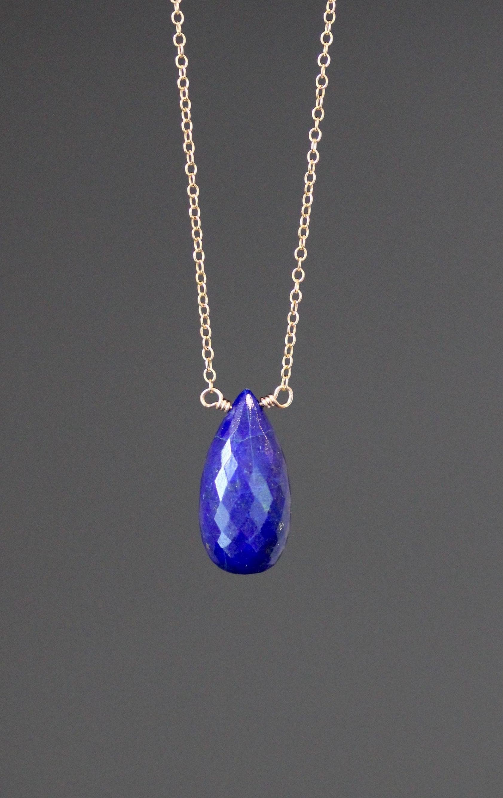 Blue faceted teardrop lapis pendant on gold filled chain necklace
