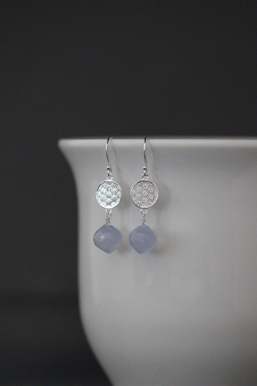 Sterling silver drop earrings with blue chalcedony teardrops and textured round discs
