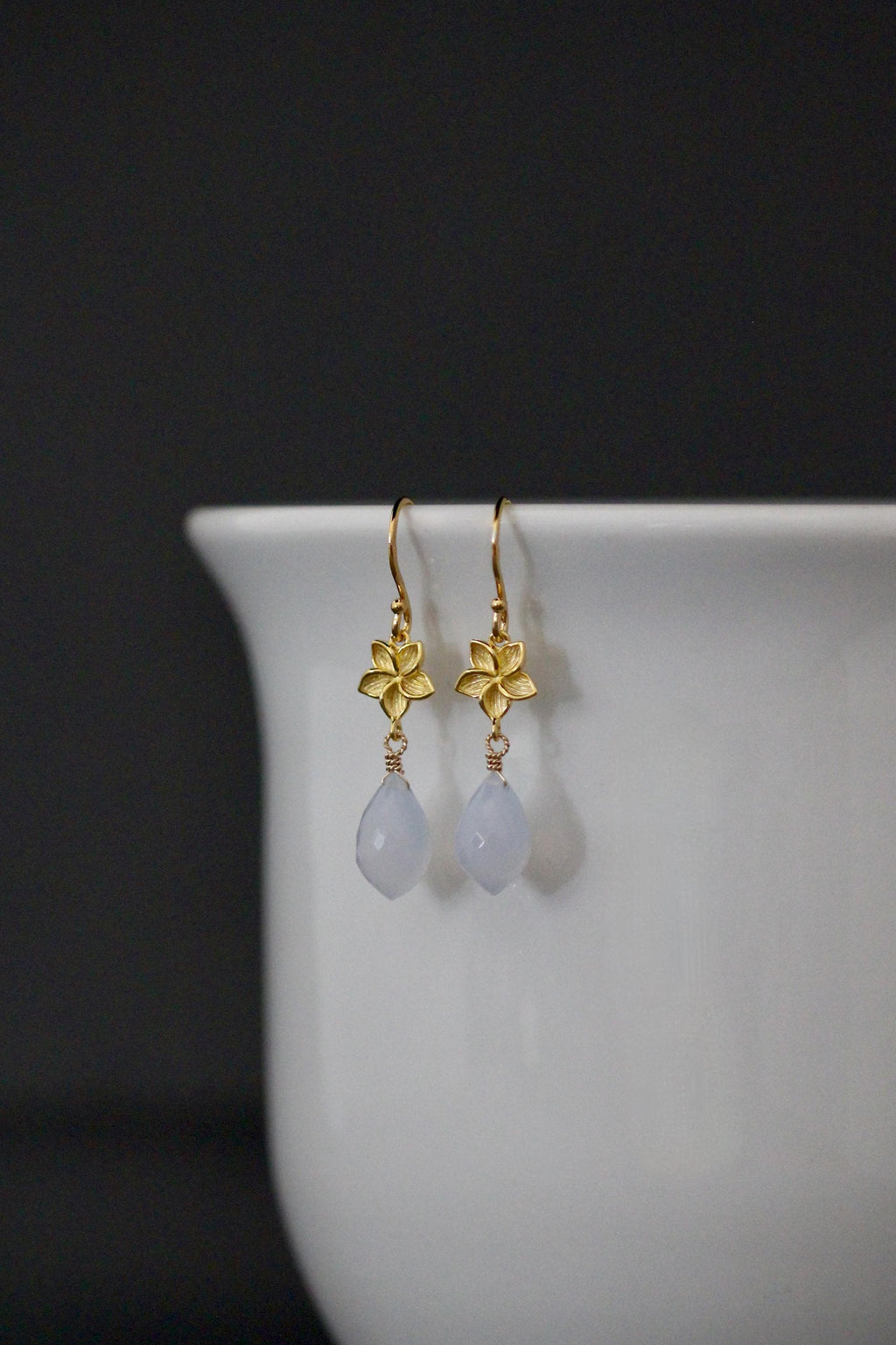 Gold vermeil flower drop earrings with pale blue teardrop chalcedony drops