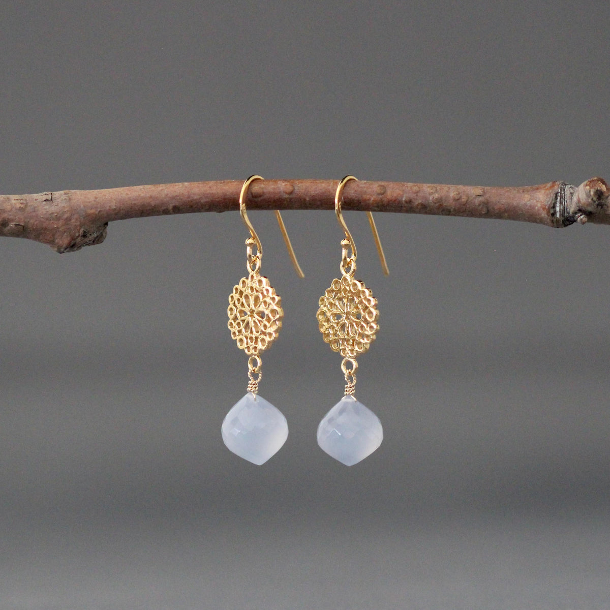 Gold vermeil dangle earrings with filigree flower links and blue chalcedony drops