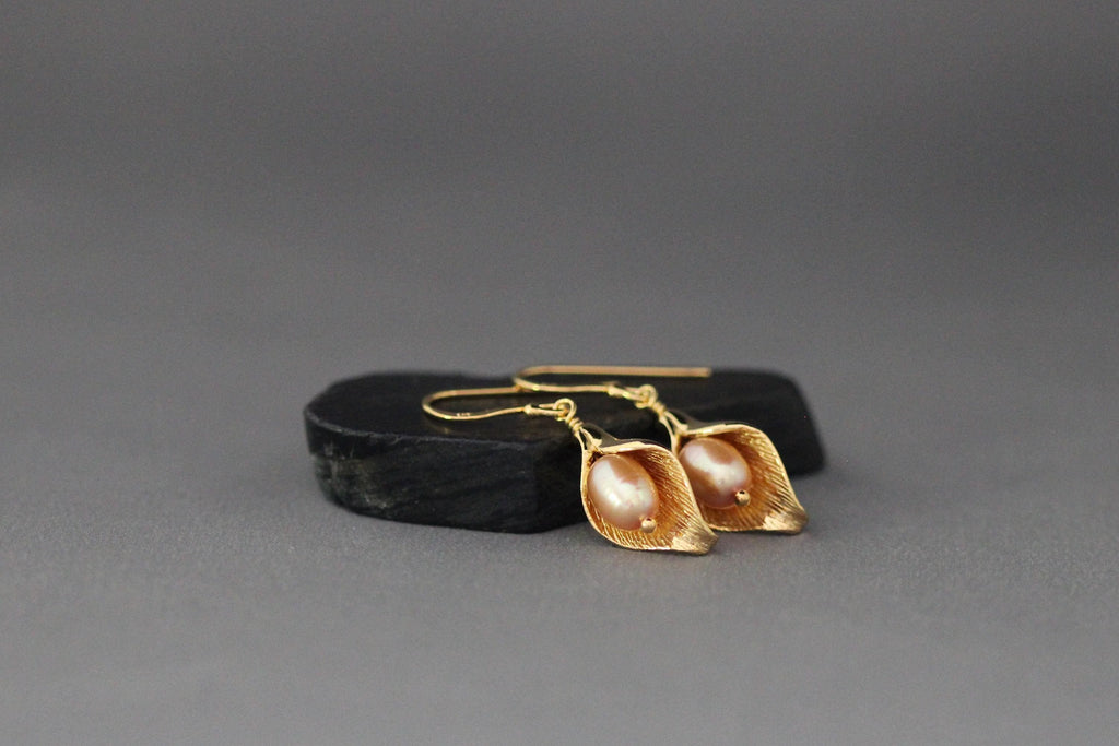 Peach freshwater pearl calla lily charm earrings with gold-toned earwires