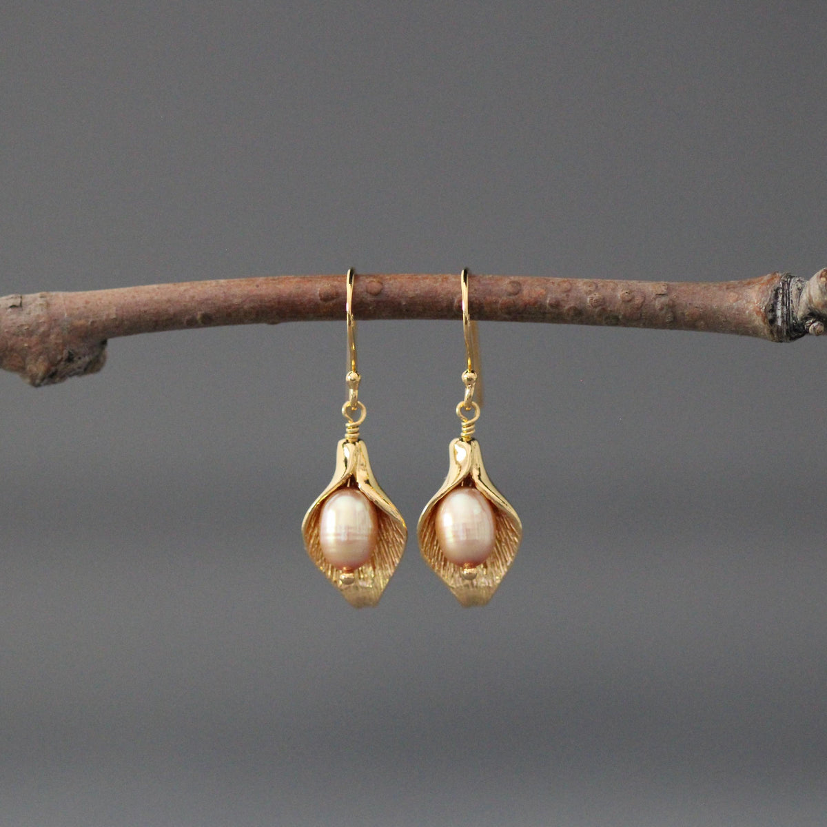 Peach freshwater pearl calla lily drop earrings with gold-toned earwires