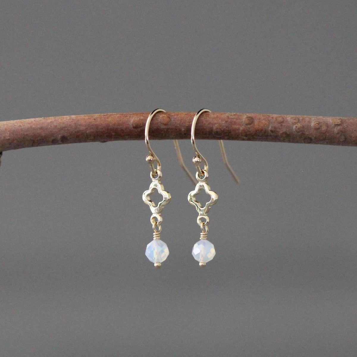 Pair of gold-filled earrings with clover links and round, pale opalite stones