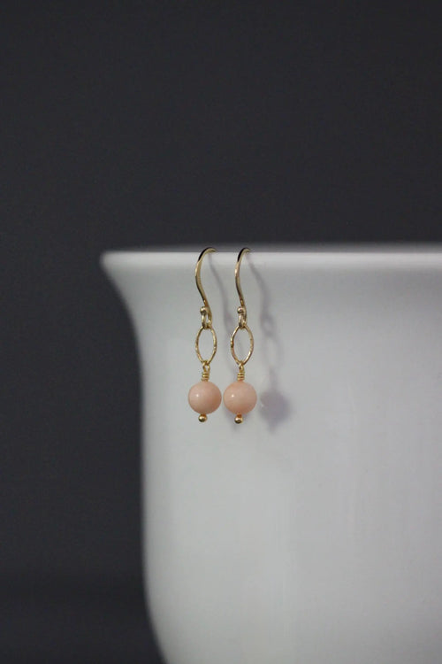 Pair of gold vermeil coral bead drop earrings with oval link detail
