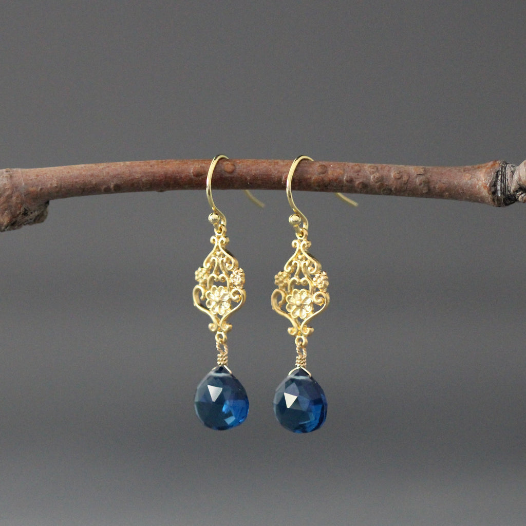 Gold vermeil filigree drop earrings with dark blue topaz teardrop stones