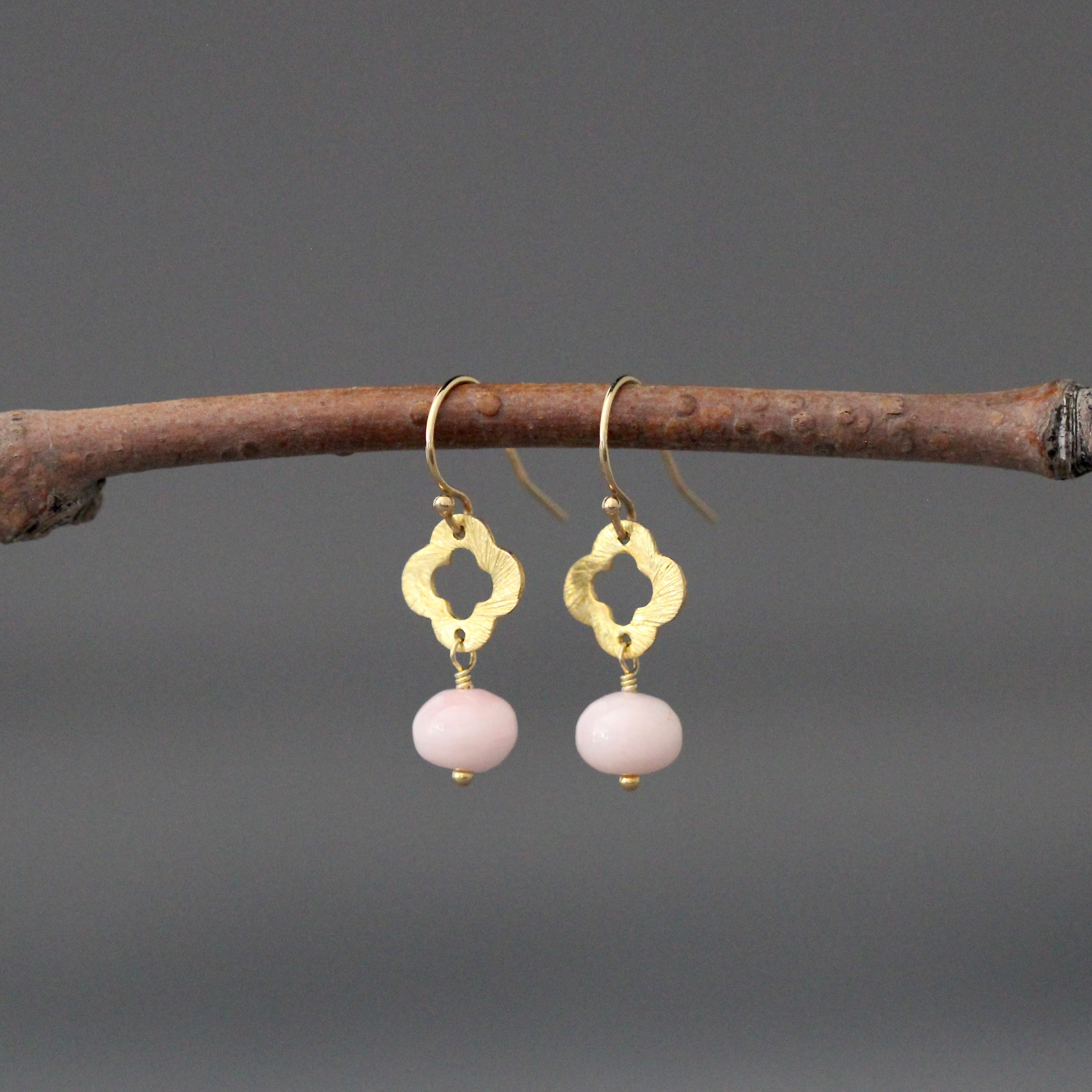Gold drop earrings with clover station charm and pink opal round bead dangles