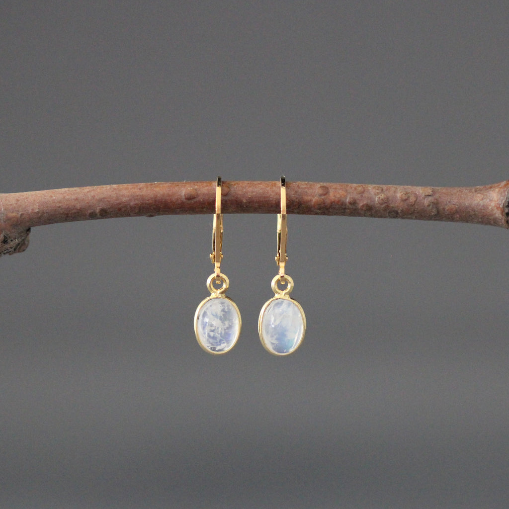 Gold vermeil leverback earrings with oval blue moonstone cabochons in bezel settings