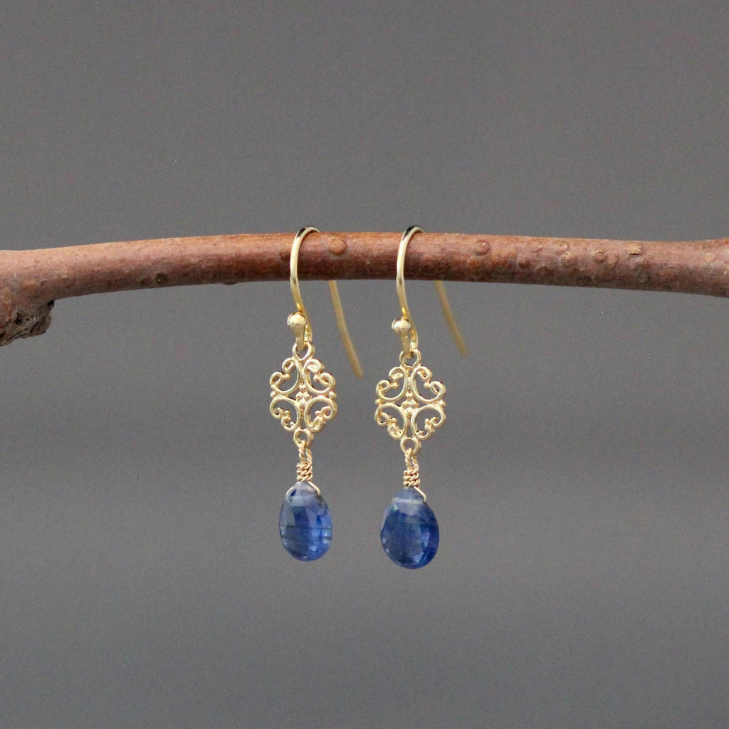 Gold vermeil drop earrings with ornate filigree and blue kyanite teardrop stones