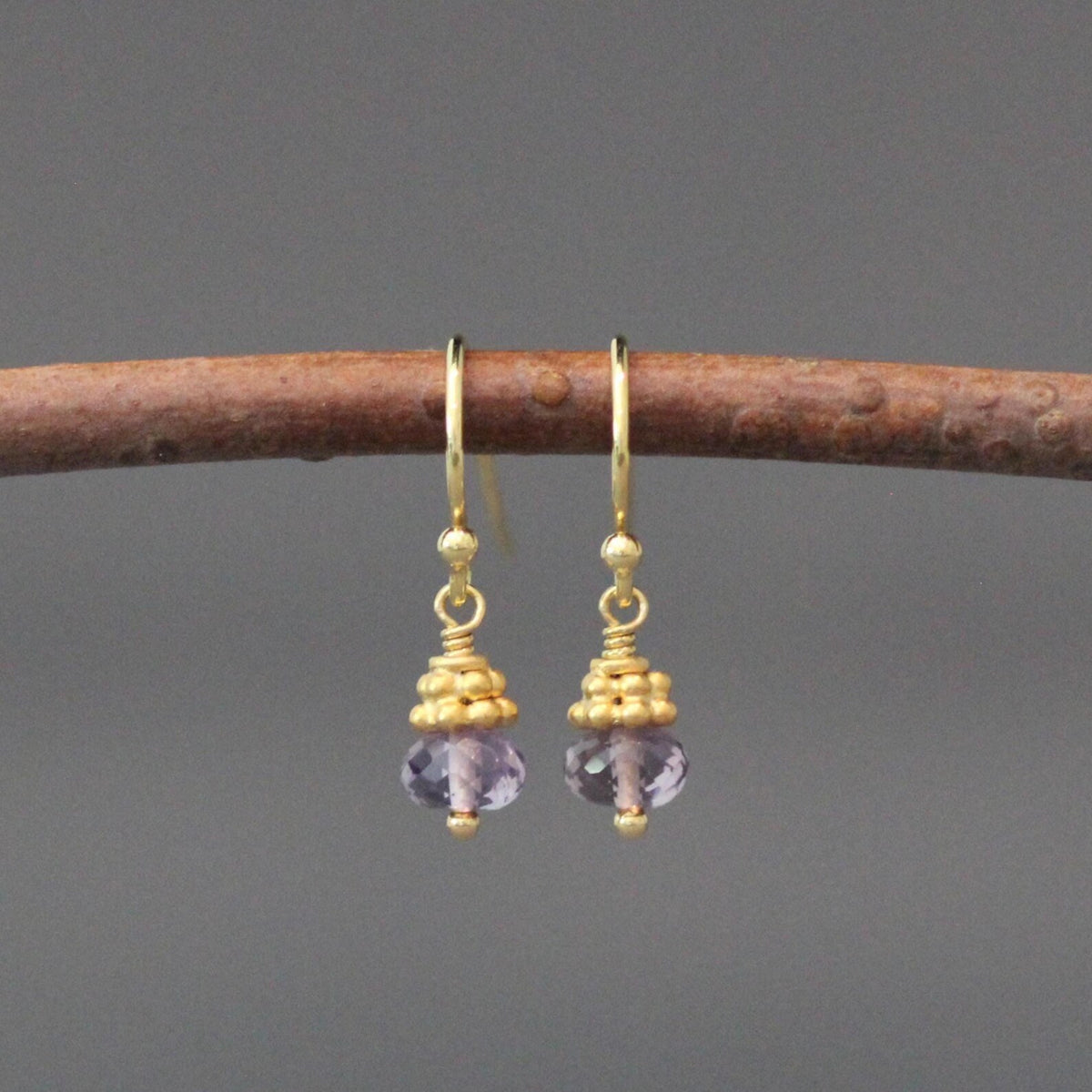 Purple amethyst button drop earrings with gold-tone bead caps and hoop ear wires