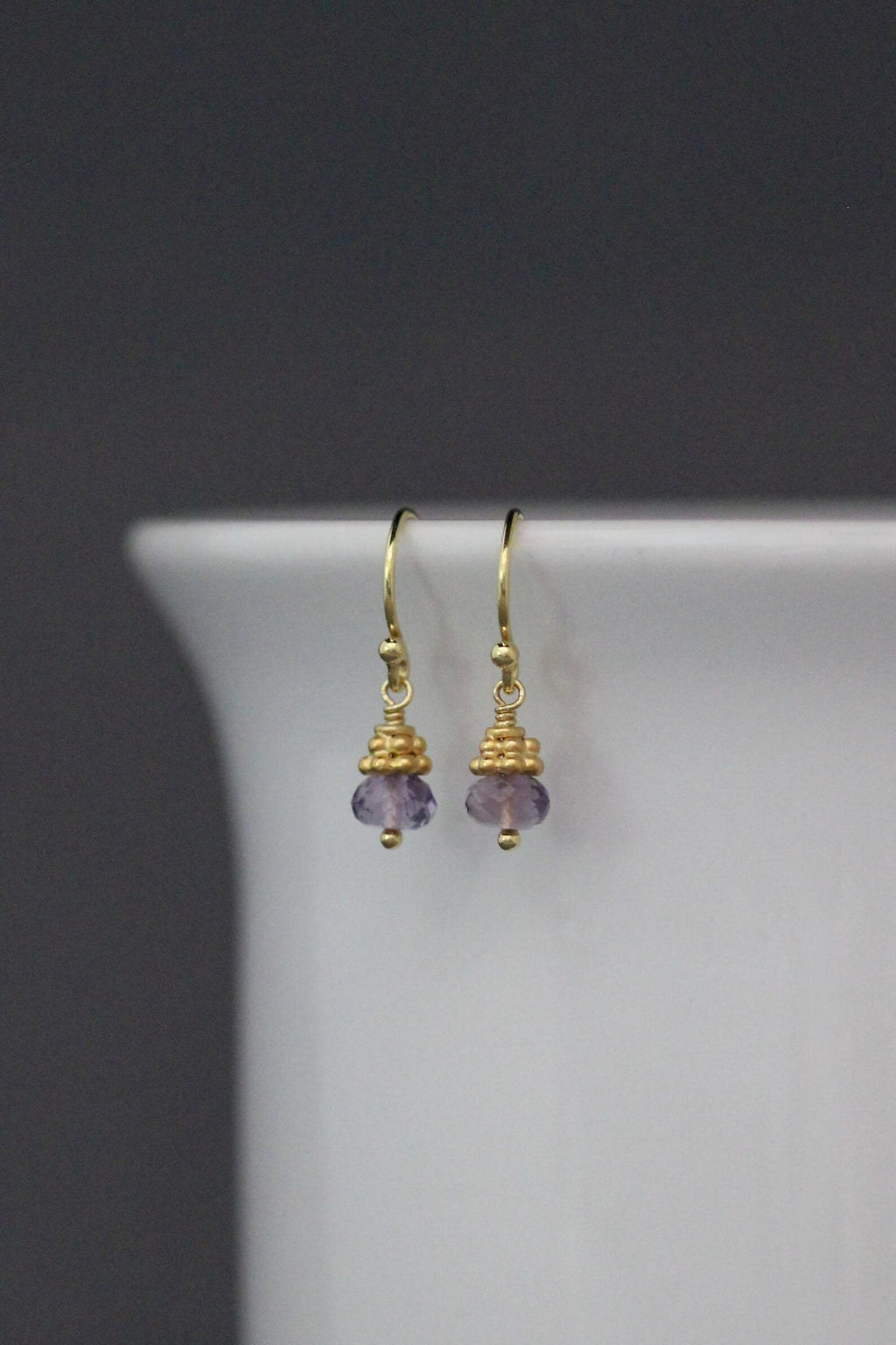 Purple amethyst button drop earrings with gold-tone ear wires and small bead details