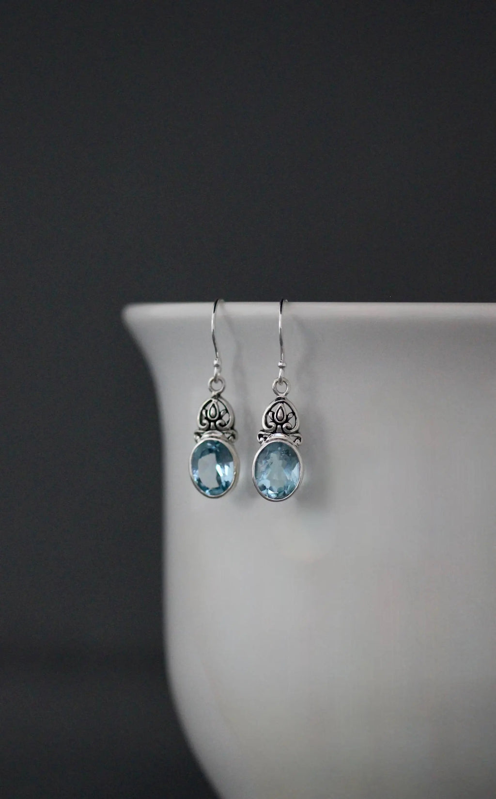 Oval-Cut Blue Topaz and Bali Silver Earrings