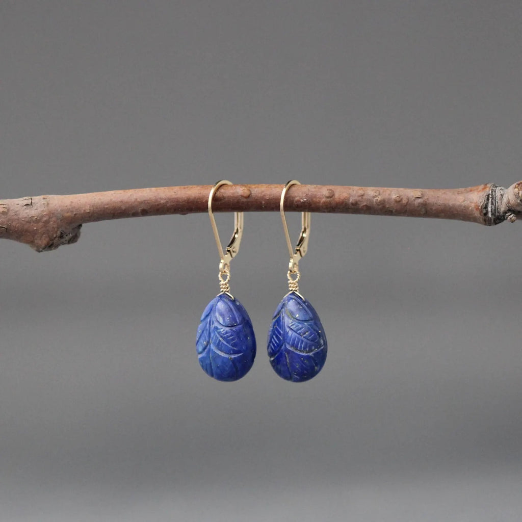 Carved blue lapis leaf teardrop earrings with gold leverback hooks