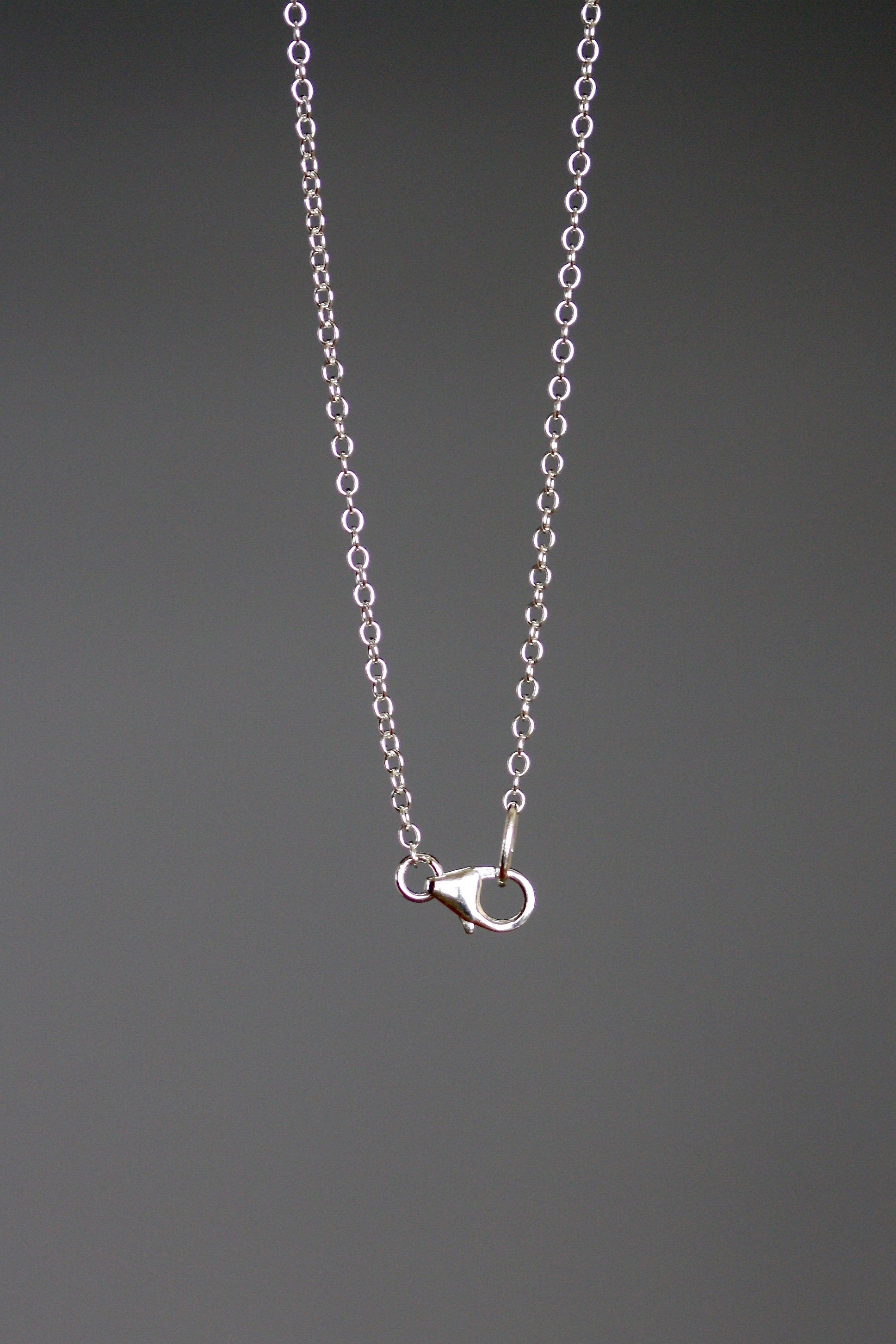 Quartz Crystal, Sand Dollar and Sea Shell Charm Necklace in Sterling Silver
