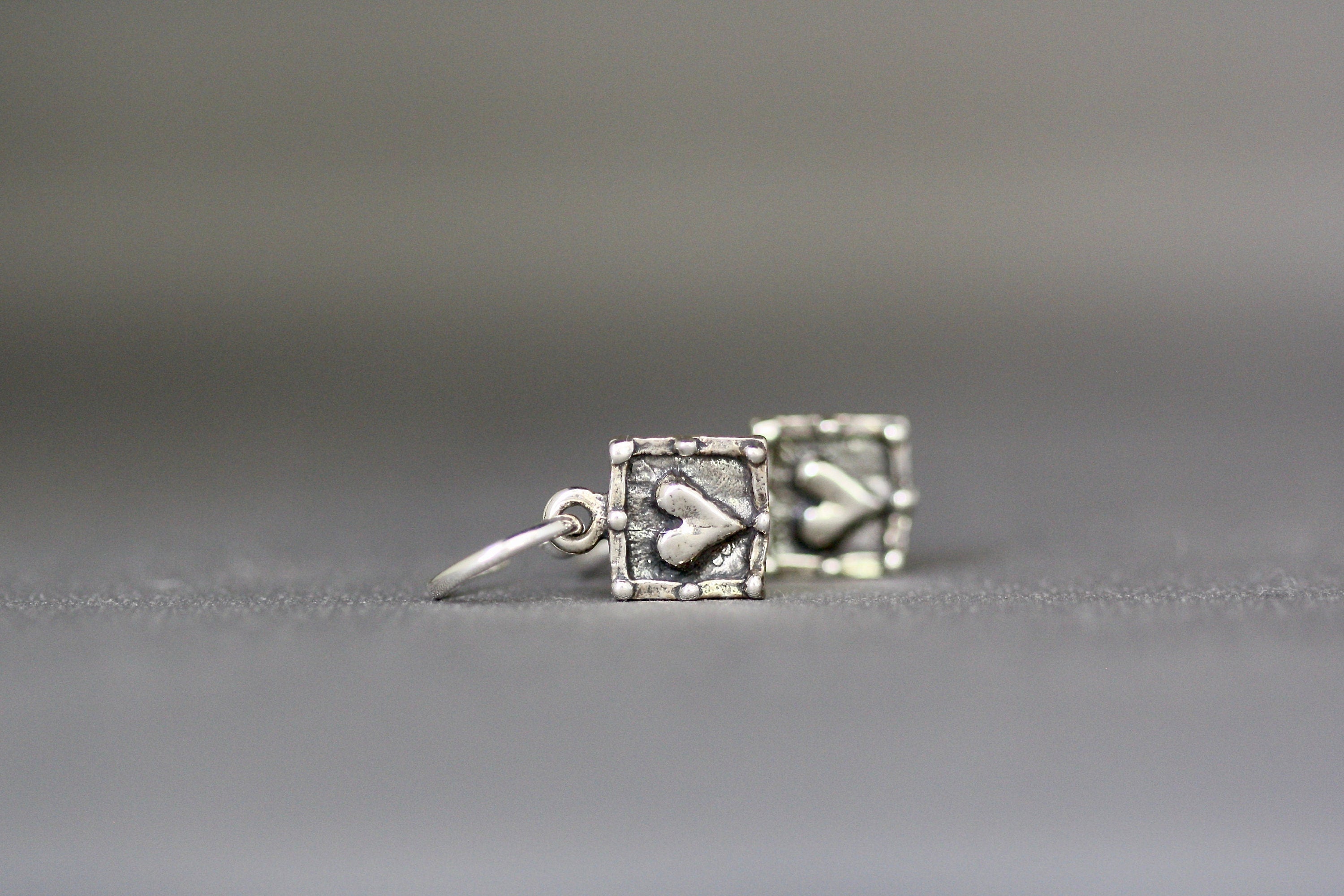 Bali Sterling Silver Heart Charm Earrings on Delicate Post Hoops