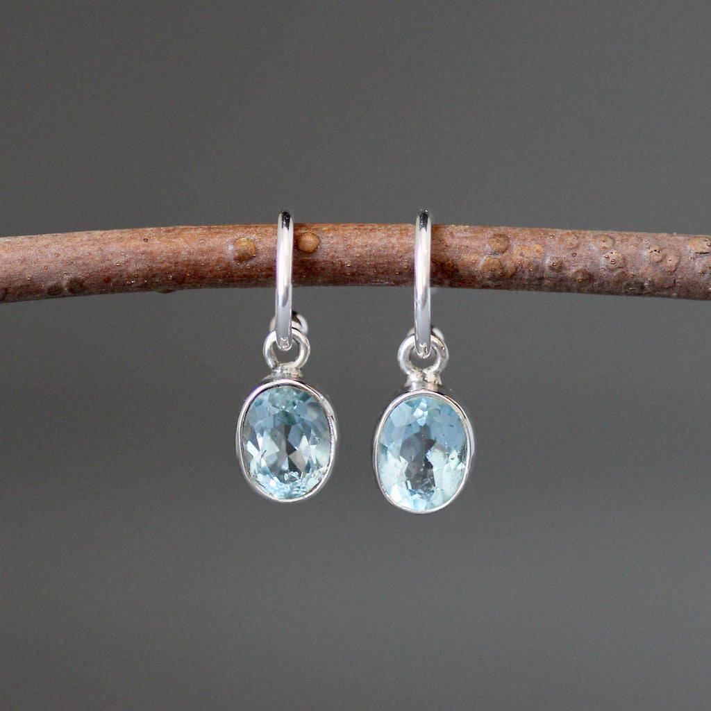 Blue Topaz Bezel Earrings Dangling from Sterling Silver Post Hoops