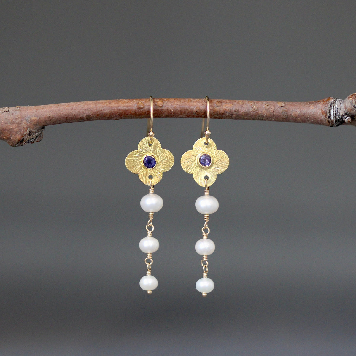 Gold vermeil flower earrings with blue iolite center and three white freshwater pearl drops