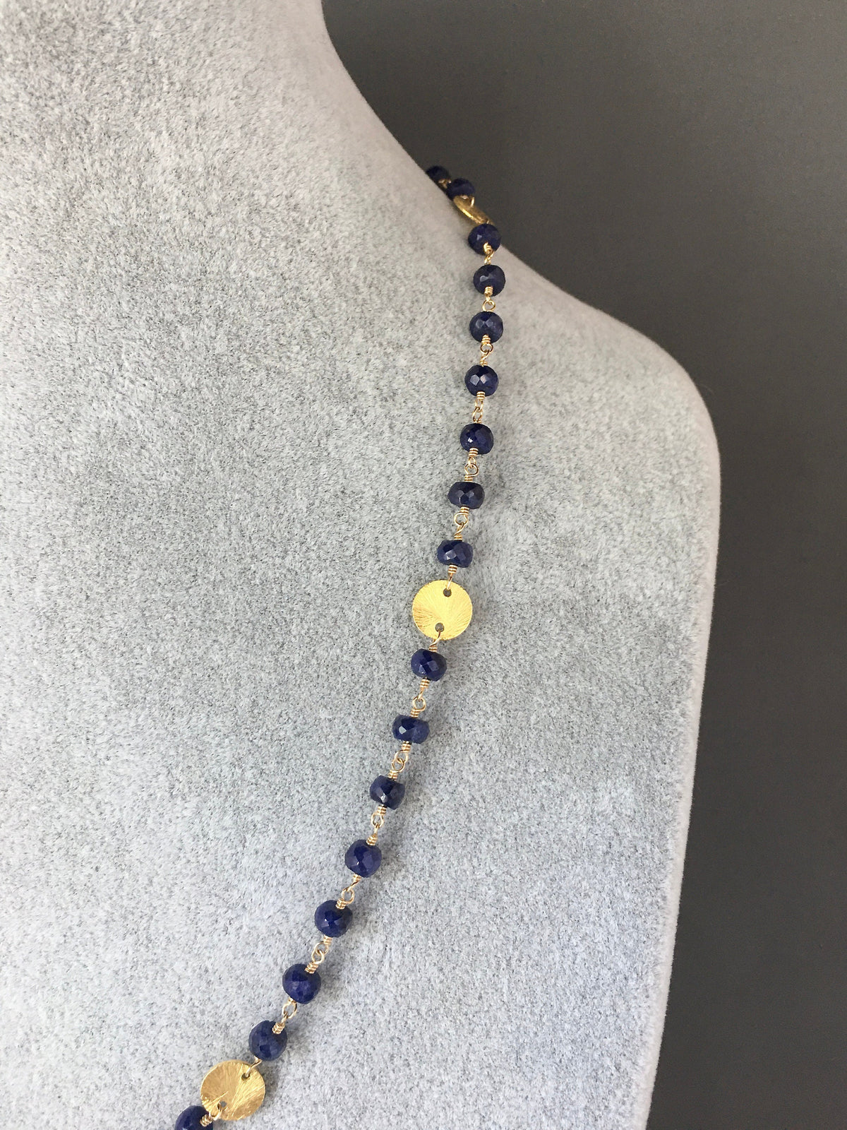 Blue and gold disc link beaded necklace with dark sapphire-blue accents