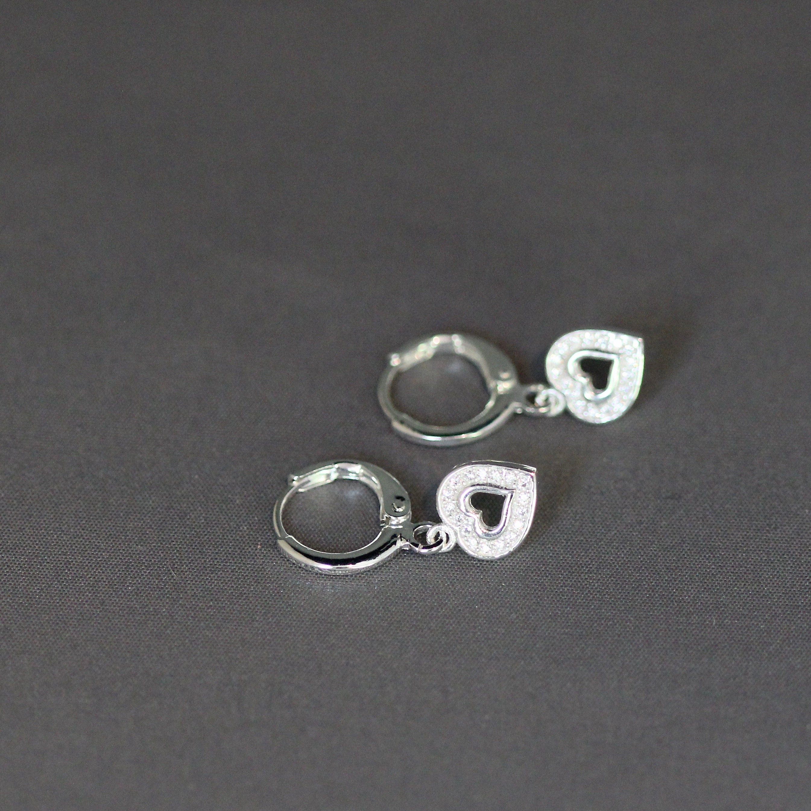 Cubic Zirconia Pave Heart Charm Earrings on Sterling Silver Huggie Hoops
