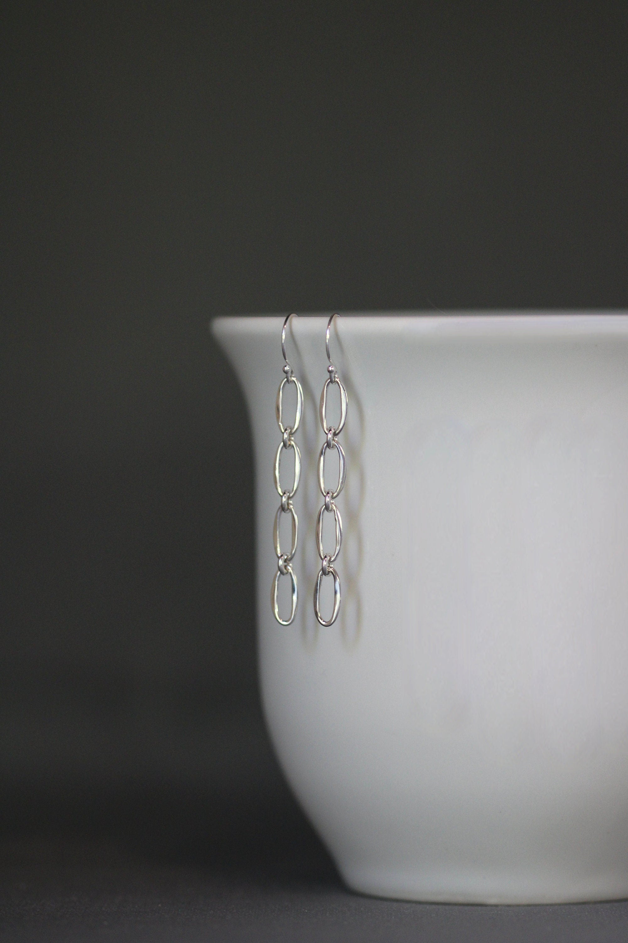Four Linked Sterling Silver Oval Ring Drop Earrings
