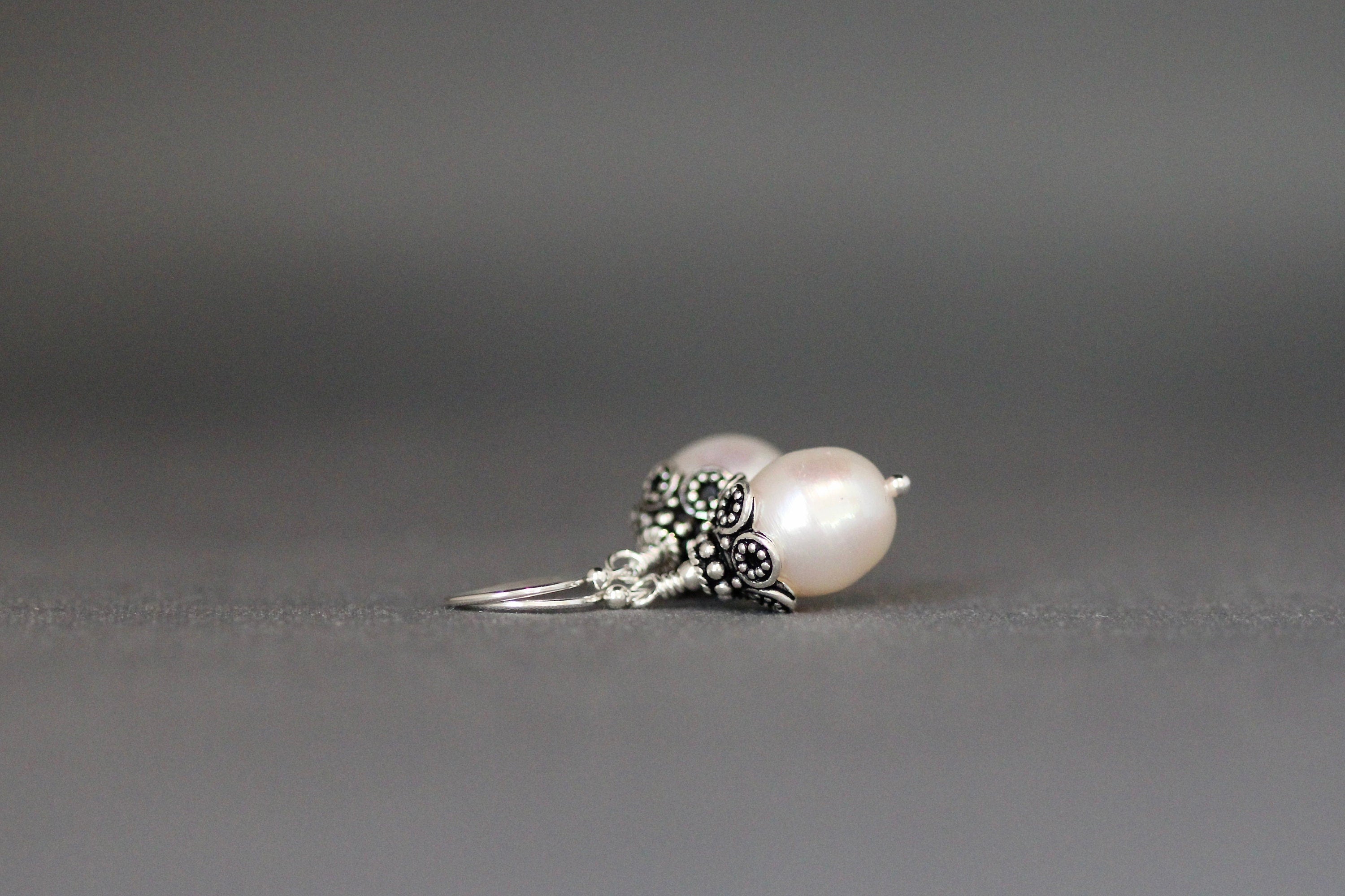 White Oval Freshwater Pearl Dangle Earrings with Bali Sterling Silver Caps