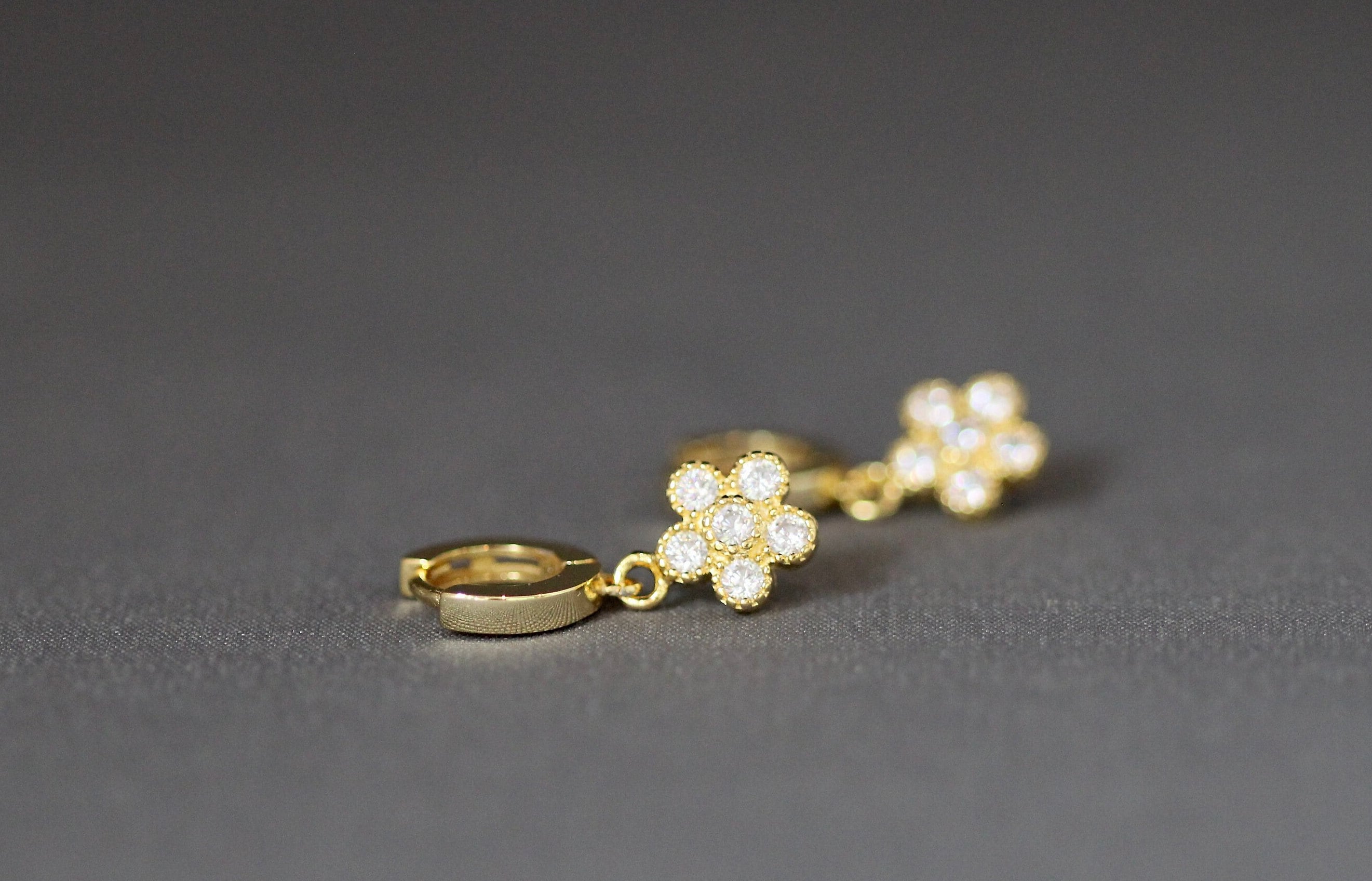 Cubic Zirconia Gold Vermeil Flower Charm Earrings on Huggie Hoops