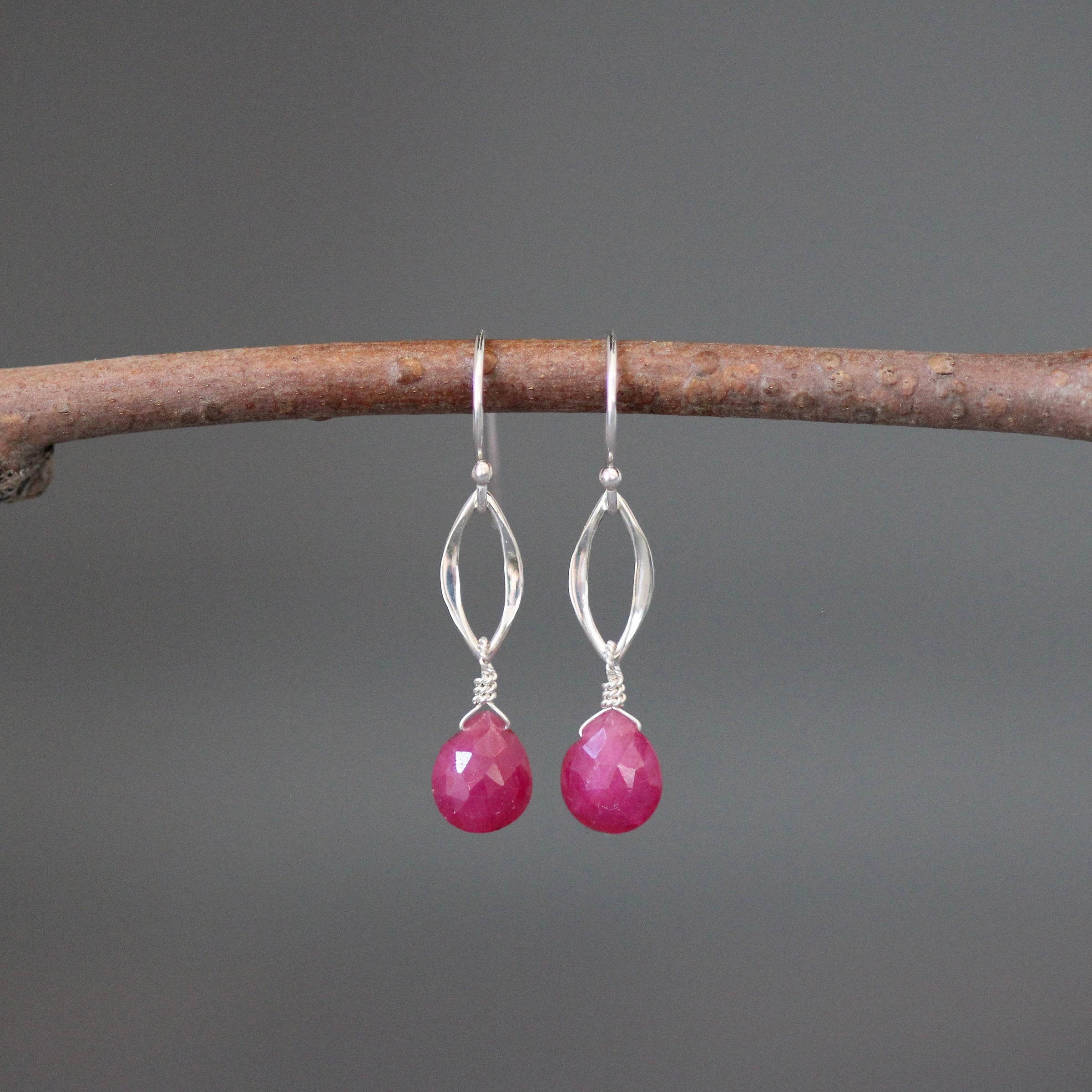 Sterling silver dangle earrings with pink teardrop stones and marquise link drops