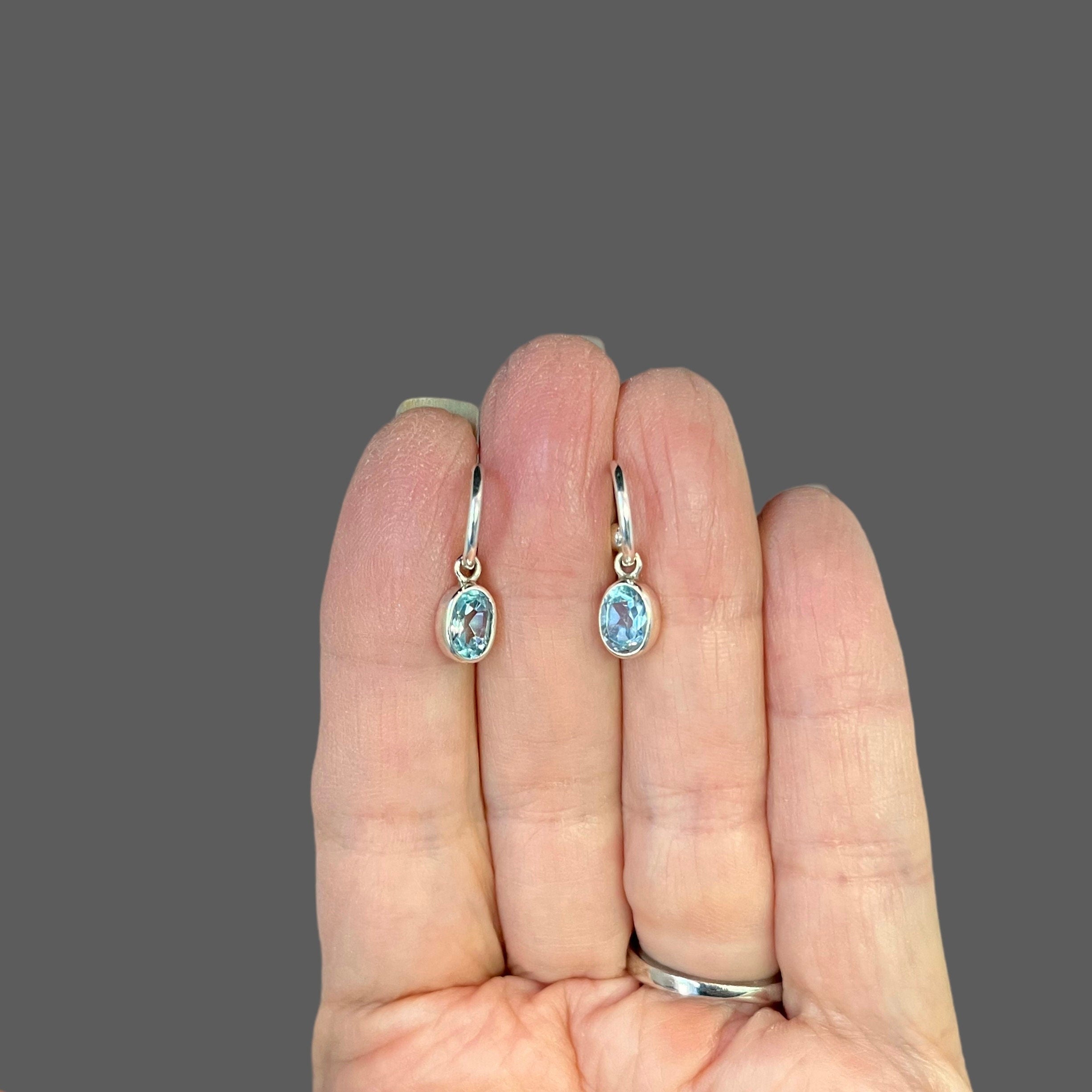 Blue Topaz Oval Bezel Charms on Sterling Silver Post Hoop Earrings