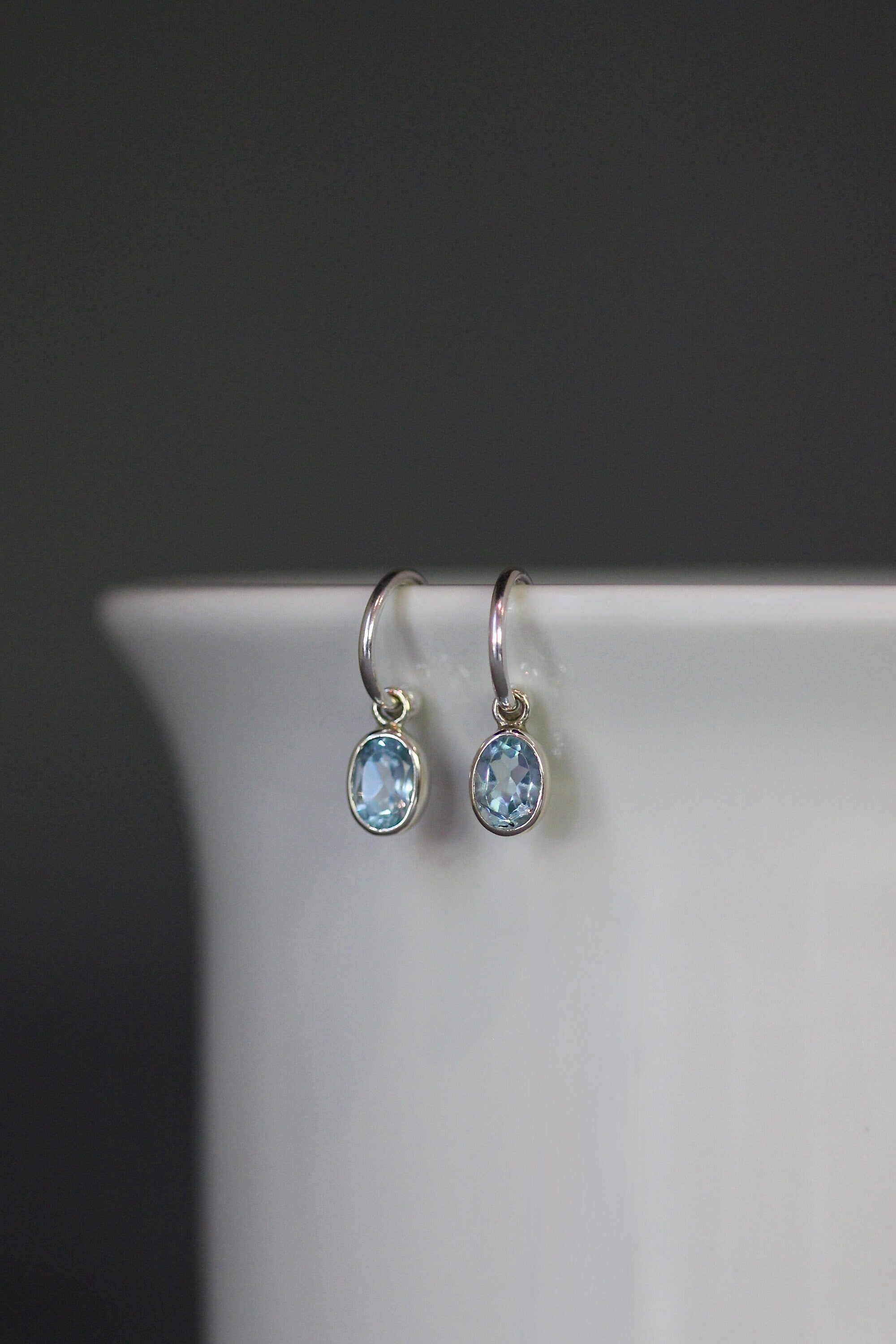 Blue Topaz Oval Bezel Charms on Sterling Silver Post Hoop Earrings