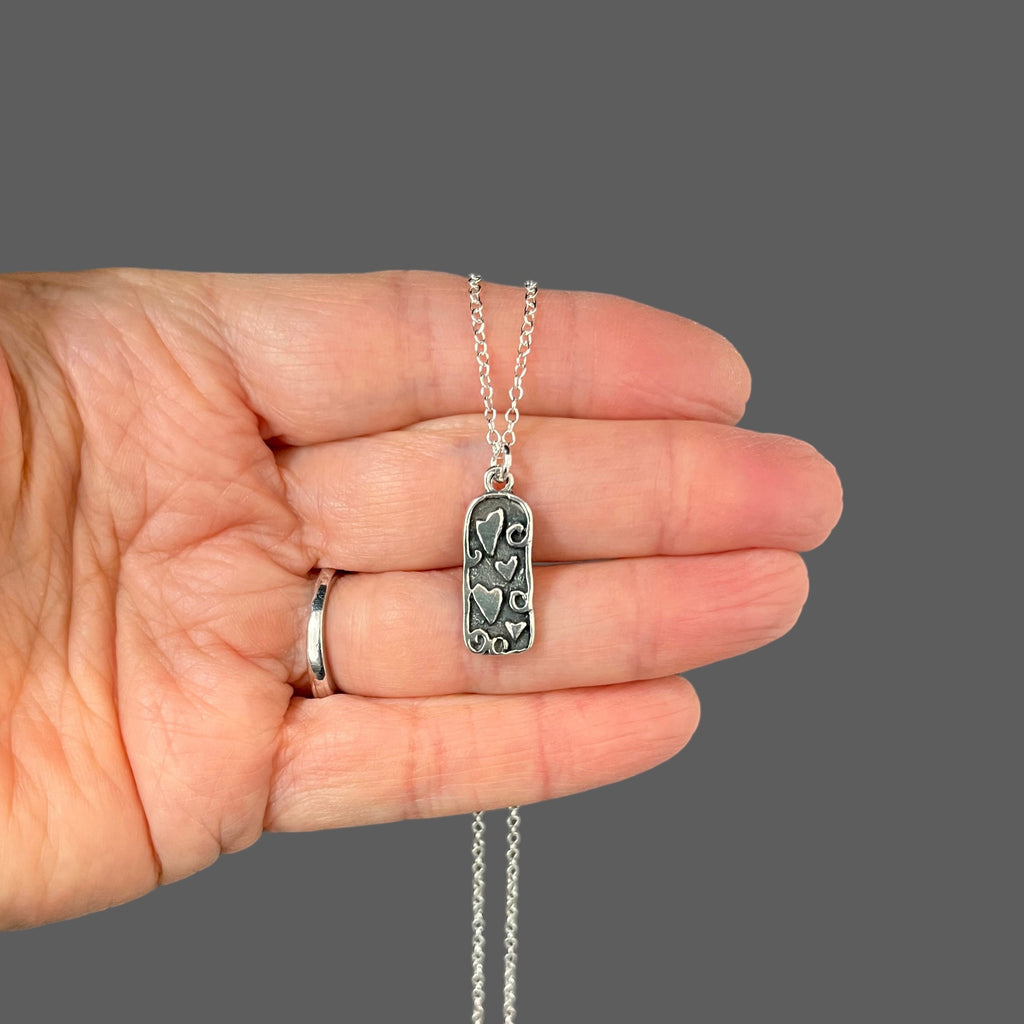 Bali Sterling Silver Four-Hearts Charm Necklace