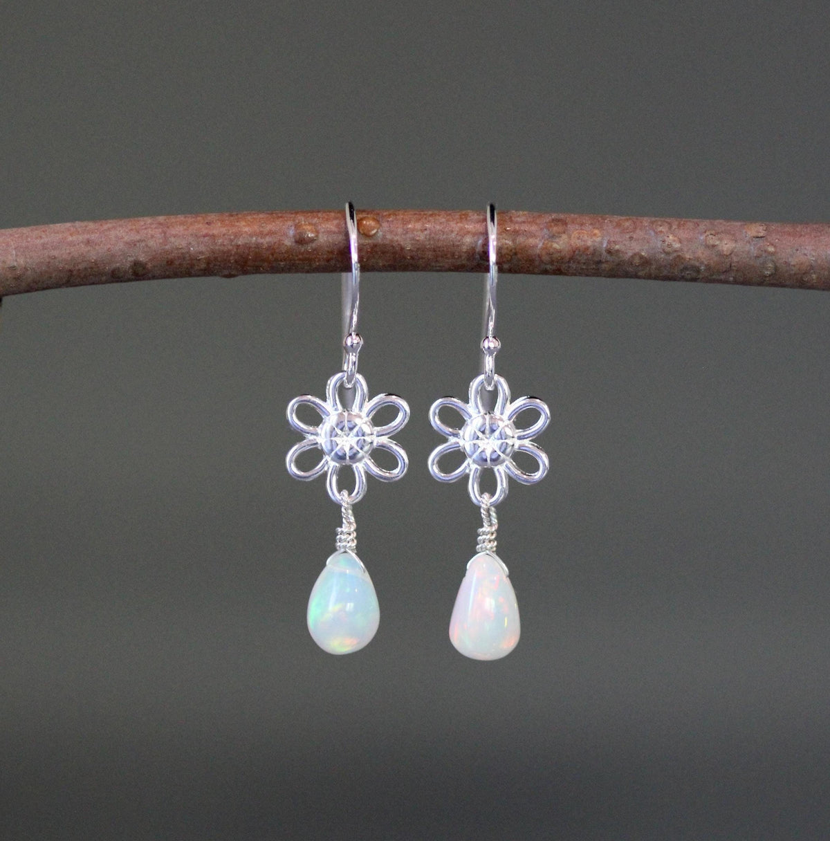 Silver flower dangle earrings with opal teardrop drops and leverback earwires