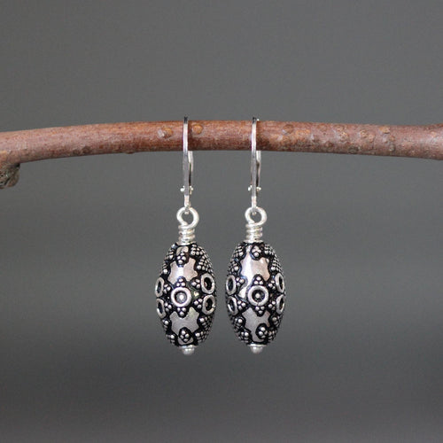 Sterling silver filigree bead dangle earrings with oval patterned drops, leverback earwires