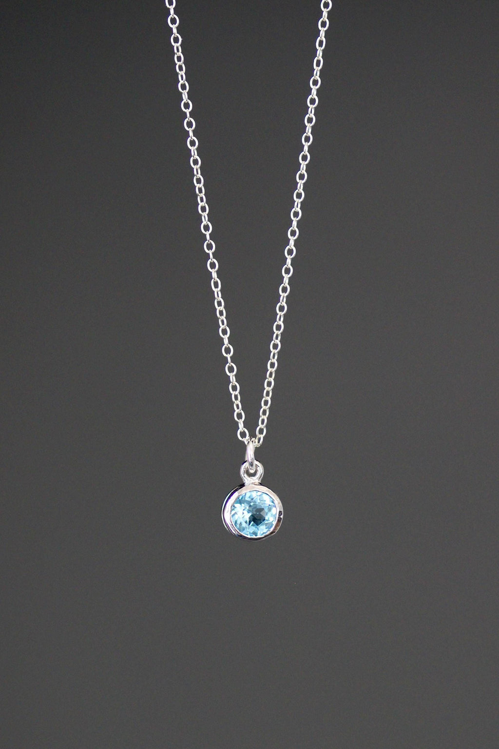 Blue Topaz Bezel Pendant Necklace in Sterling Silver