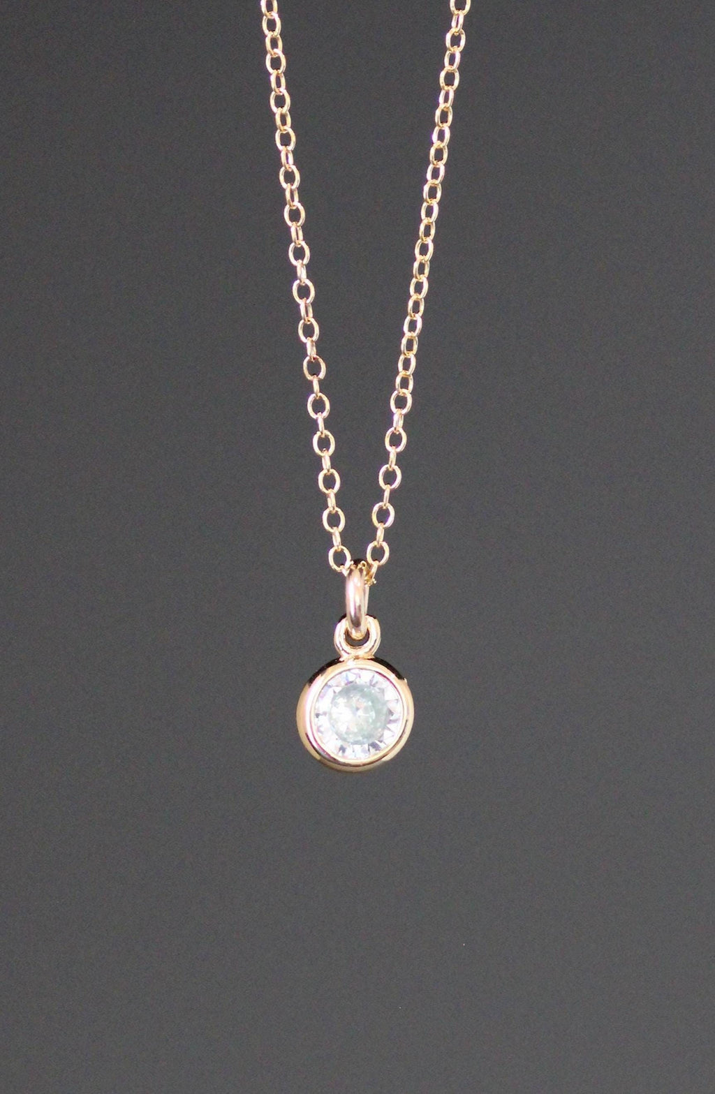 Clear Cubic Zirconia Bezel Pendant on a Gold Filled Chain Necklace