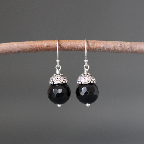 Sterling silver Bali dangle earrings with black onyx drops and ornate spiral caps