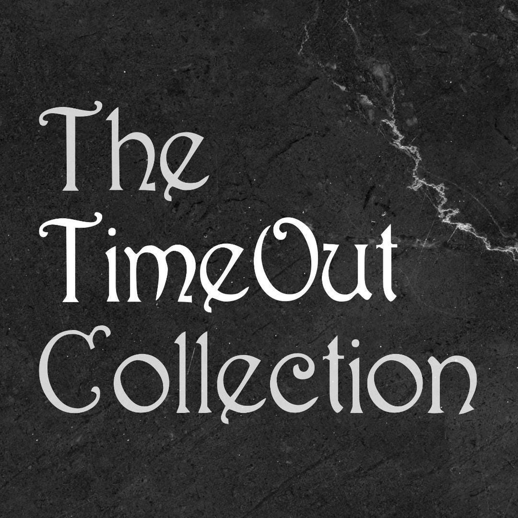 The TimeOut Collection title on a dark stone background
