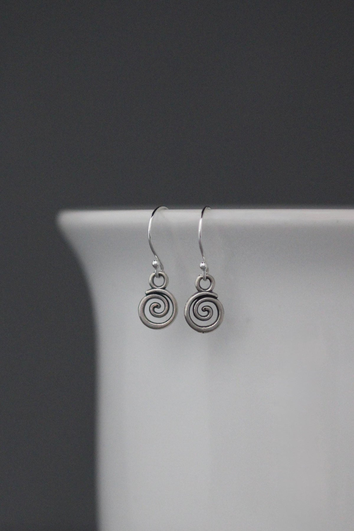 Bali Silver Swirl Charm Earrings on Sterling Silver